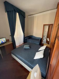 Postel nebo postele na pokoji v ubytování 69 Manin Termini