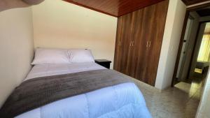 Ένα ή περισσότερα κρεβάτια σε δωμάτιο στο Casa 10