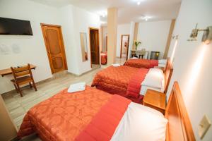 Postel nebo postele na pokoji v ubytování Suites en el Centro