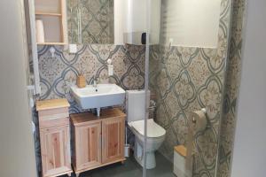 a bathroom with a sink and a toilet at Holiday Home in Sieciemin near Baltic Coast in Sieciemin +20 photos