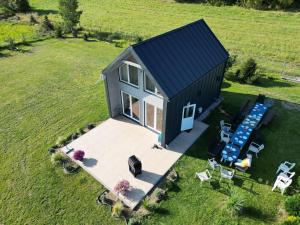an overhead view of a tiny house in a field at Holiday Home in Sieciemin near Baltic Coast in Sieciemin