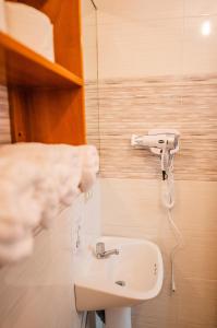 Koupelna v ubytování Suites en el Centro