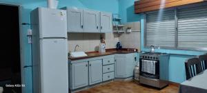 Kuchyň nebo kuchyňský kout v ubytování RINCÓN Del DESCANSO + 14 fotografií