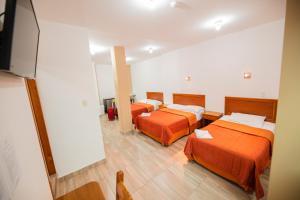 Postel nebo postele na pokoji v ubytování Suites en el Centro