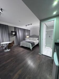 Letto o letti in una camera di Flat Higienópolis Com Varanda