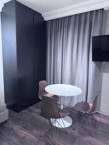 TV o dispositivi per l'intrattenimento presso Flat Higienópolis Com Varanda