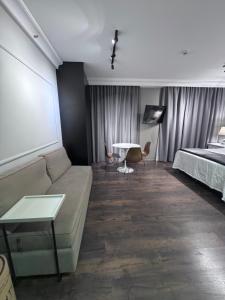 Letto o letti in una camera di Flat Higienópolis Com Varanda