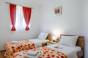 Voodi või voodid majutusasutuse Apartments with parking space Privlaka, Zadar - 23587 toas