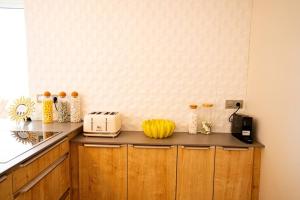 Köök või kööginurk majutusasutuses Cheerful Lemon Condo