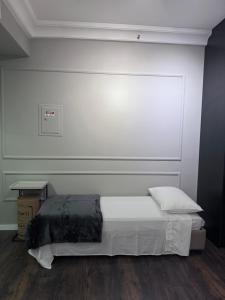 Letto o letti in una camera di Flat Higienópolis Com Varanda