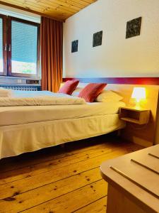 Postel nebo postele na pokoji v ubytování Hotel Nest