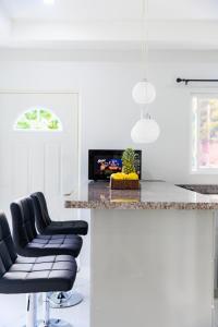 TV in/ali zabaviščno središče v nastanitvi Caldera Villas