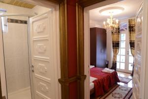 Ένα ή περισσότερα κρεβάτια σε δωμάτιο στο Apartmani Vivaldi Niš