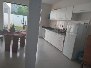 Kuchyň nebo kuchyňský kout v ubytování Duplex Luque