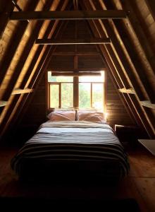 Postel nebo postele na pokoji v ubytování Chalets Amarelo