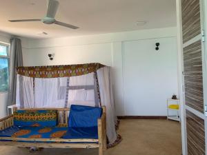 Postel nebo postele na pokoji v ubytování Pandu vocation apartment