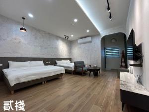 Una cama o camas en una habitación de 苞棧旅宿