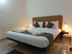 Letto o letti in una camera di SM Residency