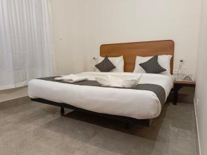 Letto o letti in una camera di SM Residency