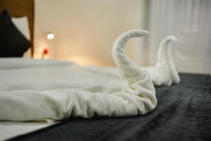 Letto o letti in una camera di SM Residency