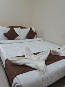 Letto o letti in una camera di SM Residency