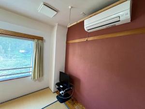 TV a/nebo společenská místnost v ubytování Yuzawa house2