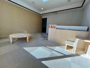 Postel nebo postele na pokoji v ubytování Yuzawa house2