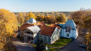 an aerial view of a large house at Boutique Hotel Virkas muiža in Kuldīga