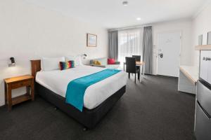 Postel nebo postele na pokoji v ubytování Econo Lodge Border Gateway Wodonga + 33 fotografií