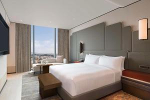 Rúm í herbergi á Hilton Kathmandu