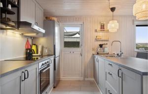 Η κουζίνα ή μικρή κουζίνα στο Holiday Home Binderup Strandpark Iv +16 φωτογραφίες