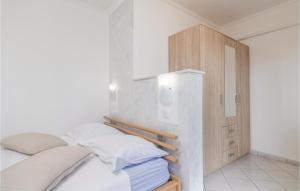 Postel nebo postele na pokoji v ubytování Stunning Apartment In Labin With Wifi