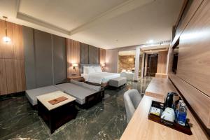 Taman Prakerti Bhuana Hotel客房内的一张或多张床位