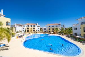 an image of a swimming pool at a resort at Cabanas de Tavira Family Apartment in Cabanas de Tavira