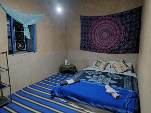 Postel nebo postele na pokoji v ubytování Guest House Nomad Life