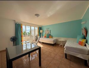 Postel nebo postele na pokoji v ubytování TROPIC Appartements village pierre et vacances vue mer Martinique Sainte Luce