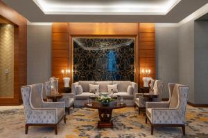 Posezení v ubytování Rixos Premium Alamein