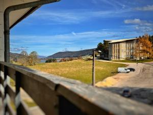 a view of a building from a balcony at Les Rousses Du Lac in Les Rousses