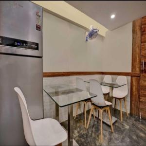 Kuchyň nebo kuchyňský kout v ubytování Hotel Elegant - Mohammed Ali Road