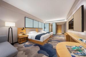 Ảnh trong thư viện ảnh của Echarm Hotel Zibo Zhangdian District Government Polytechnic University ở Truy Bác