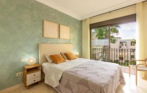 Ένα ή περισσότερα κρεβάτια σε δωμάτιο στο Green And Sea Apartment Roda