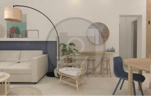 una sala de estar con un sofá y una mesa en Cozy Apartment In Starigrad Paklenica, en Starigrad-Paklenica