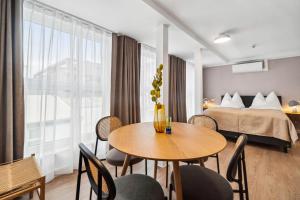 Ένα ή περισσότερα κρεβάτια σε δωμάτιο στο Limehome Kassel Wilhelmsstraße