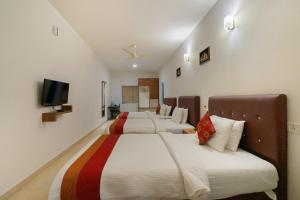 Katil atau katil-katil dalam bilik di The Sanihara Hotel & Resort