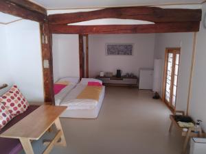 Postel nebo postele na pokoji v ubytování Healing hanok in Otgol village