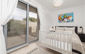Posteľ alebo postele v izbe v ubytovaní Pet Friendly Home In Krk