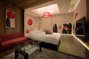 Letto o letti in una camera di Nagoya Hotel HOQA Hanaironoyu