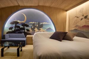 Letto o letti in una camera di Nagoya Hotel HOQA Hanaironoyu