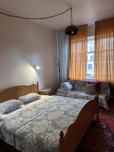 Postel nebo postele na pokoji v ubytování Fontaine Valhalla Hotel