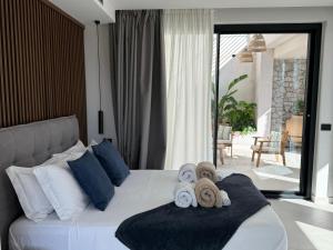 a bedroom with a bed with towels on it at Villa Ada in Taormina +39 photos